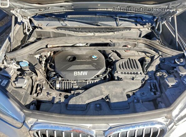 WBXHT3Z36G4A49348 2016 BMW X1 Silver Widok wnętrza z tyłu