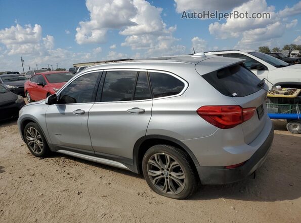 WBXHT3Z36G4A49348 2016 BMW X1 Silver Tył lewy