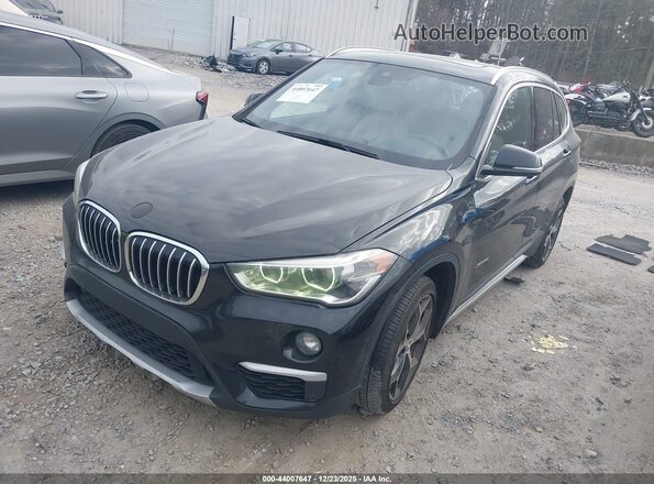 WBXHT3Z39G4A51238 2016 BMW X1 Black Przód lewy