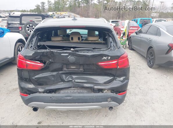 WBXHT3Z39G4A51238 2016 BMW X1 Black Widok z przodu