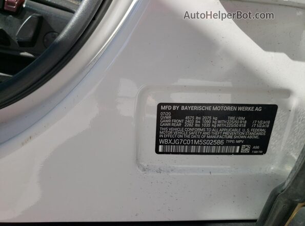 WBXJG7C01M5S02586 2021 BMW X1 White Vista de la etiqueta del VIN