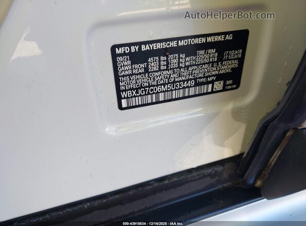 WBXJG7C06M5U33449 2021 BMW X1 White Engine compartment view