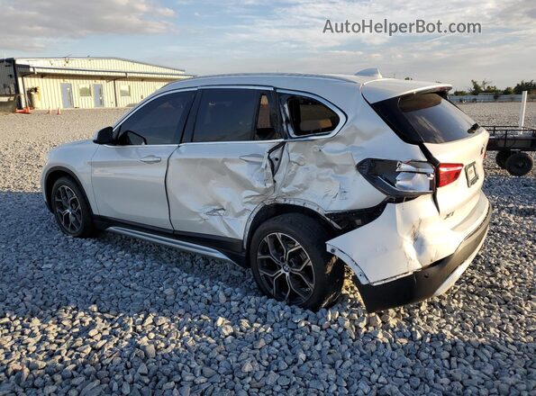 WBXJG9C02L5P68055 2020 BMW X1 White Trasero izquierdo