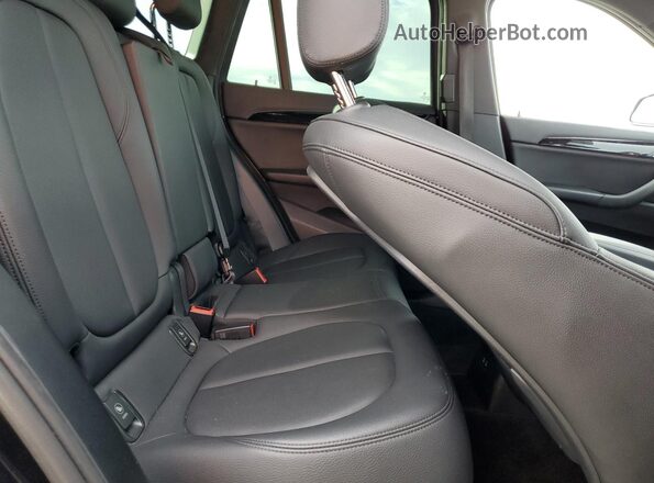 WBXJG9C03L3L24369 2020 BMW X1 Black Rear interior view