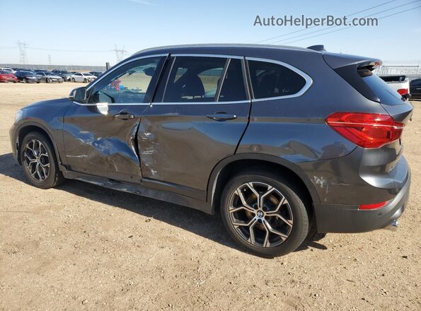 WBXJG9C08L5P89704 2020 BMW X1 Charcoal Trasero izquierdo
