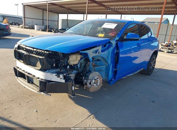 WBXYH9C04P5V31469 2023 BMW X2 Blue Vista tres cuartos delantera izquierda