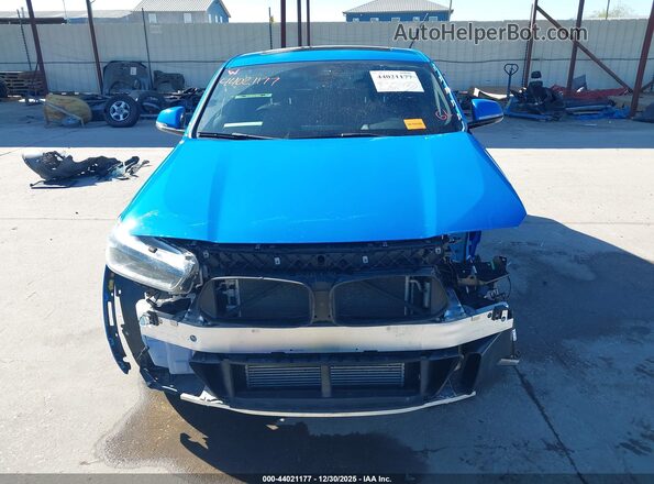 WBXYH9C04P5V31469 2023 BMW X2 Blue Vista interior trasera
