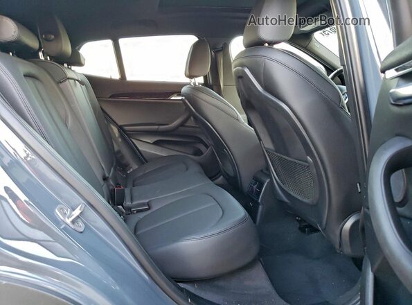 WBXYH9C05M5S06597 2021 BMW X2 Gray Rear interior view
