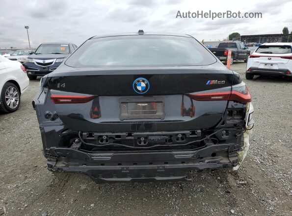 WBY33AW09PFP29511 2023 BMW I4 Black Rear view