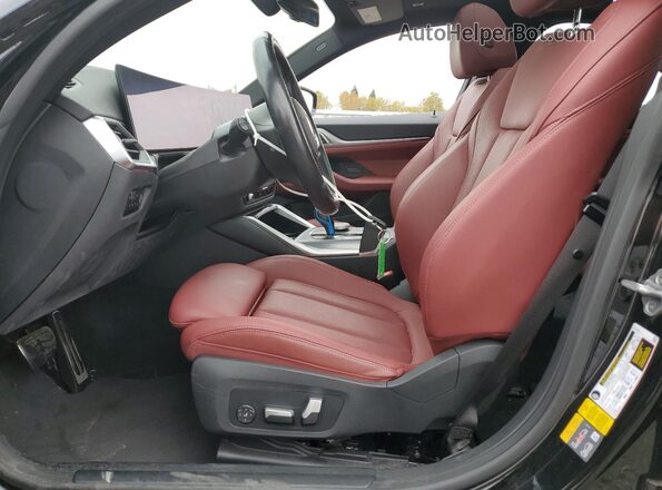 WBY33AW09PFP29511 2023 BMW I4 Black Front interior view