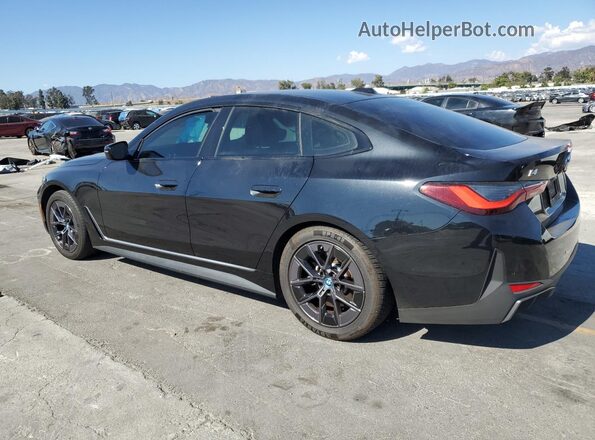 WBY43AW06PFP55570 2023 BMW I4 Black უკანა მარცხენა