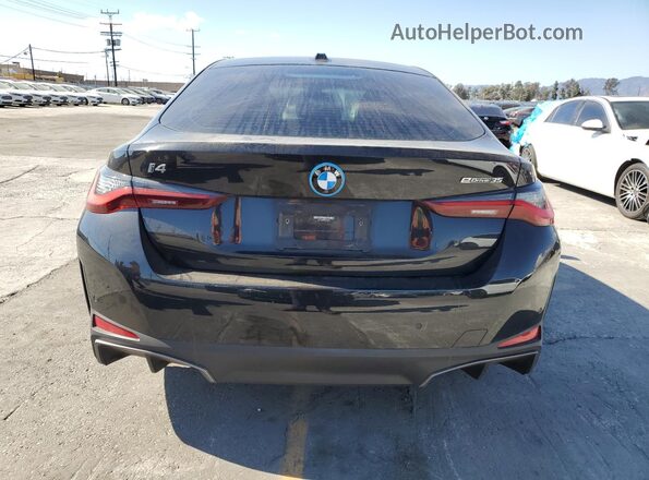 WBY43AW06PFP55570 2023 BMW I4 Black უკანა ხედი