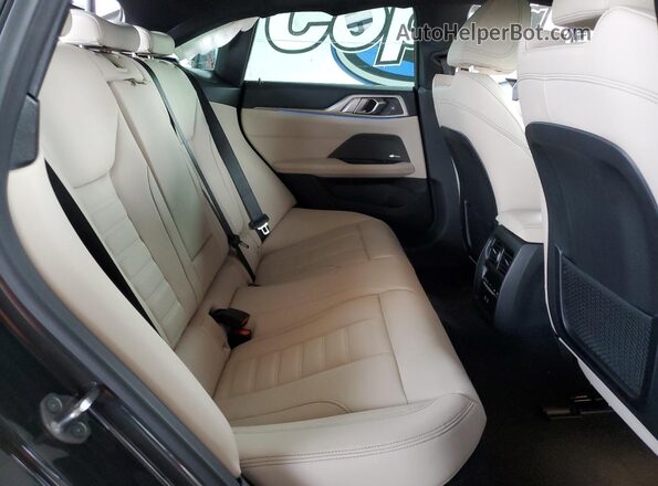 WBY43AW08RFR99420 2024 BMW I4 Silver Widok tylnych siedzeń
