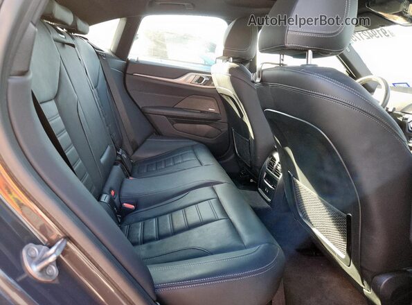 WBY73AW04PFN92589 2023 BMW I4 Charcoal Rear seats view