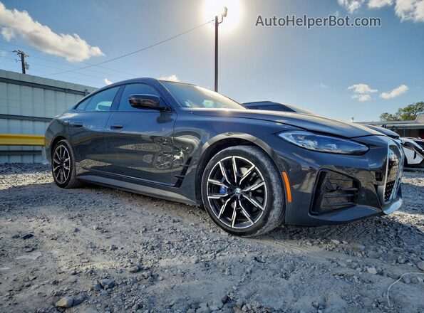 WBY73AW04PFN92589 2023 BMW I4 Charcoal Front right