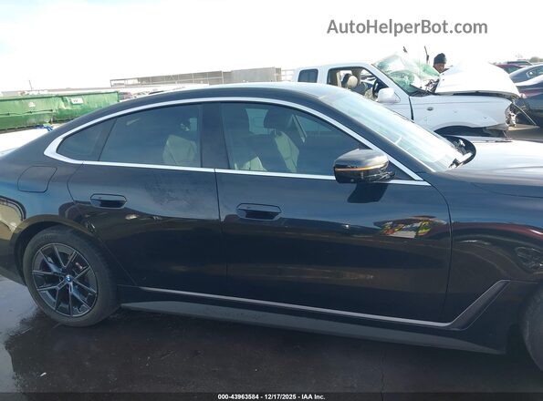 WBY73AW05PFR43302 2023 BMW I4 Black Vista interior trasera