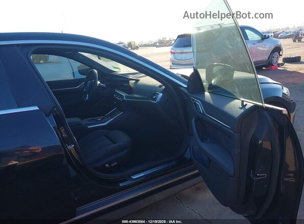 WBY73AW05PFR43302 2023 BMW I4 Black Vista interior delantera