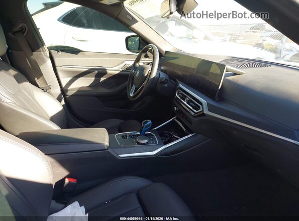 WBY73AW07PFN87435 2023 BMW I4 Gray Vista interior delantera