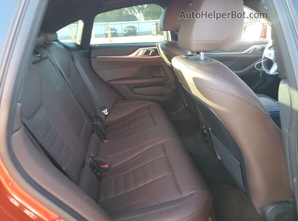 WBY73AW0XPFN76994 2023 BMW I4 Orange Vista de los asientos traseros