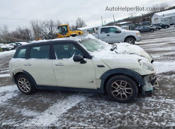 WMWLU1C54H2F27599 2017 MINI CLUBMAN Tan Սալոնի հետևի տեսք