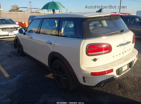 WMWLV7C09L2M25581 2020 MINI CLUBMAN Кремовый Задняя левая четверть