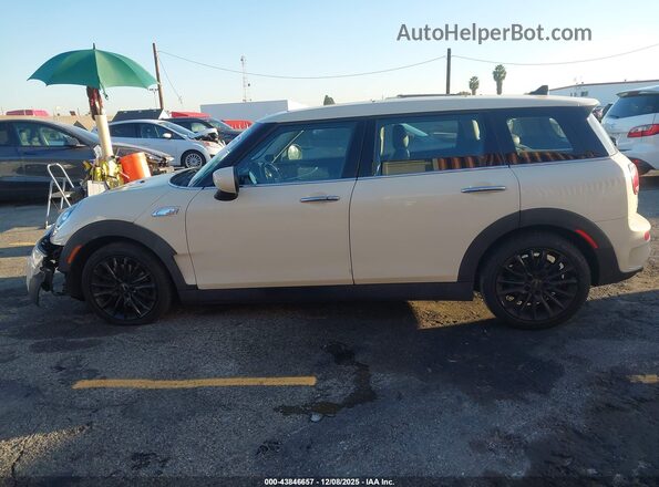 WMWLV7C09L2M25581 2020 MINI CLUBMAN Кремовый Вид задней части салона