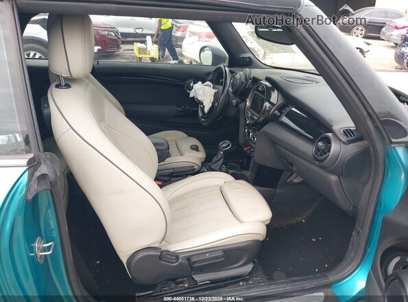 WMWWG9C57H3C22675 2017 MINI CONVERTIBLE Бирюзовый Вид салона спереди