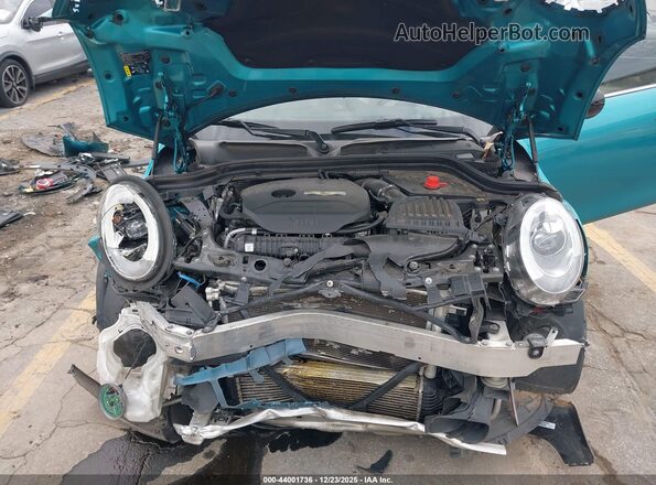WMWWG9C57H3C22675 2017 MINI CONVERTIBLE Бирюзовый Вид сзади