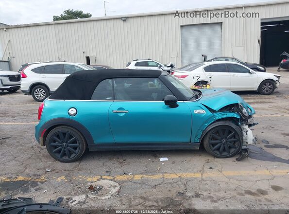 WMWWG9C57H3C22675 2017 MINI CONVERTIBLE Бирюзовый Вид задней части салона
