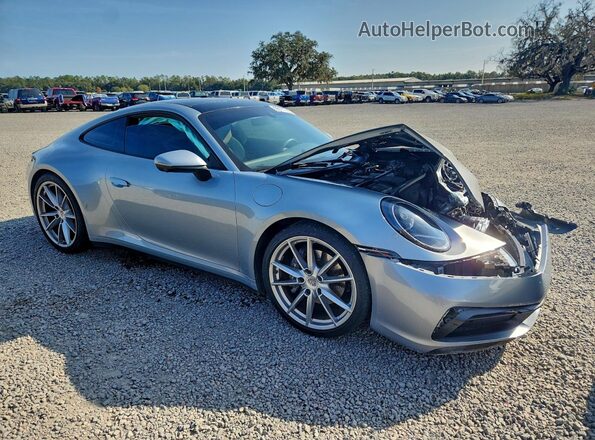 WP0AA2A95MS205589 2021 PORSCHE 911 Серебряный Передняя правая четверть