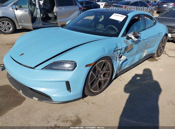 WP0AA2Y15SSA11600 2025 PORSCHE TAYCAN Blue წინა მარცხენა ხედი სამი მეოთხედიდან