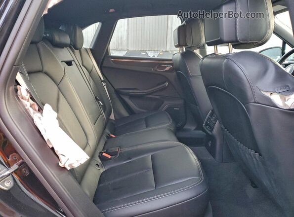 WP1AF2A55PLB56728 2023 PORSCHE MACAN Black Vista interior trasera