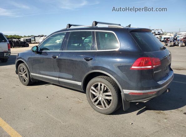 WVGEF9BP7GD010865 2016 VOLKSWAGEN TOUAREG Black Trasero izquierdo