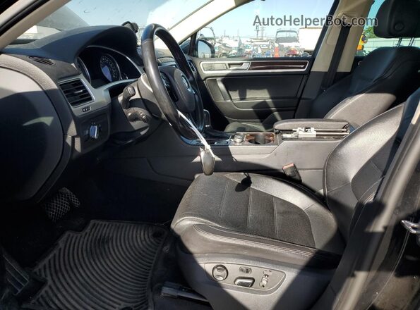WVGEF9BP7GD010865 2016 VOLKSWAGEN TOUAREG Black Vista interior delantera