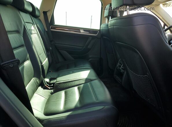 WVGEF9BP7GD010865 2016 VOLKSWAGEN TOUAREG Black Vista interior trasera