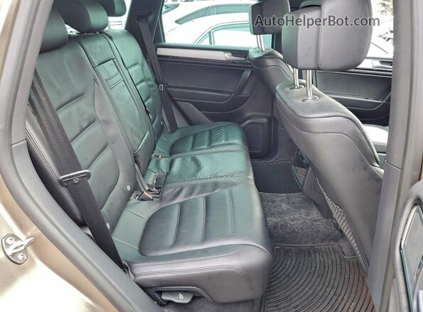 WVGRF7BP1HD005054 2017 VOLKSWAGEN TOUAREG Gold Rear interior view