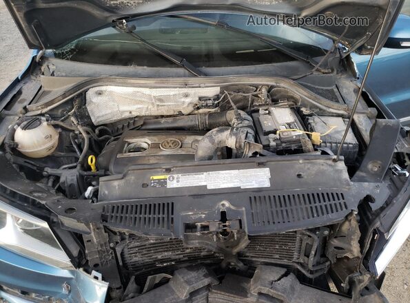 WVGSV7AX3HK026800 2017 VOLKSWAGEN TIGUAN Blue უკანა სალონის ხედი