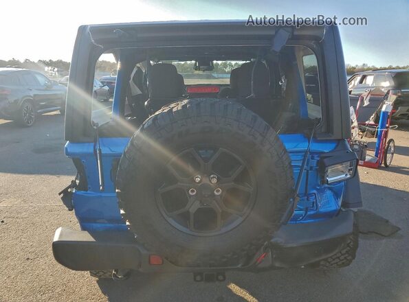 1C4PJXDNXTW156672 2026 JEEP WRANGLER Blue უკანა ხედი