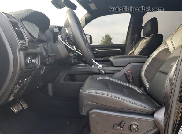 1C6SRFUP8TN152308 2026 RAM 1500 Черный Вид салона спереди