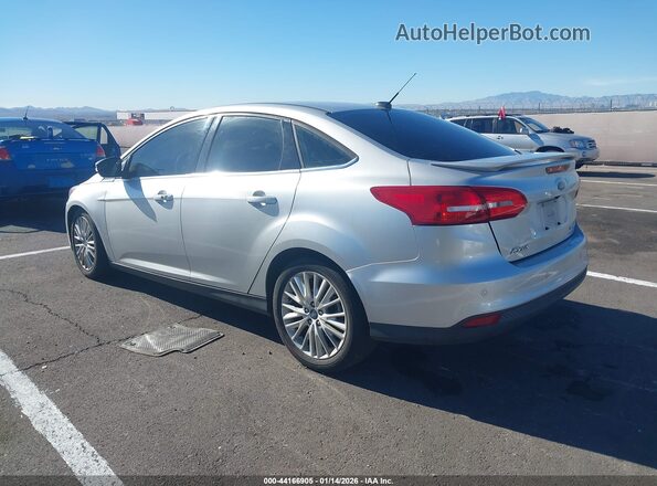 1FADP3J28HL288185 2017 FORD FOCUS Серебряный Задняя левая четверть