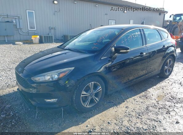 1FADP3KE0GL243880 2016 FORD FOCUS Black Przód lewy
