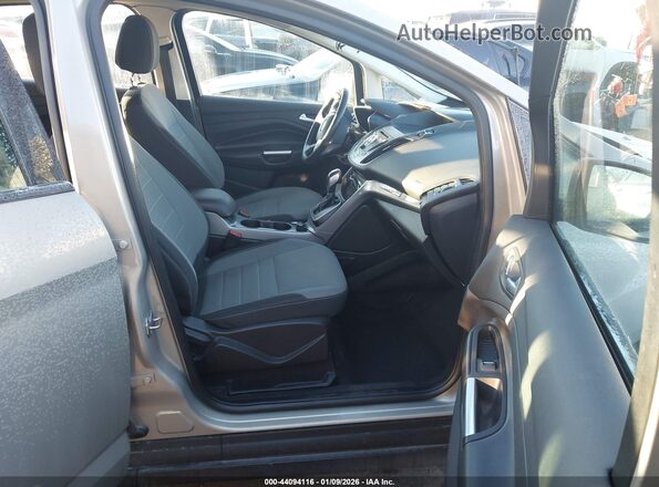 1FADP5AU0GL100254 2016 FORD C-MAX HYBRID Tan Widok wnętrza z przodu