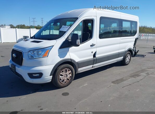 1FBAX2C8XMKA64672 2021 FORD PASSENGER White Front left