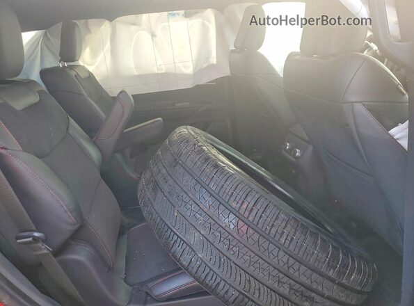 1FMWK8GC4TGA34212 2026 FORD FORD EXPLORER Red Rear interior view