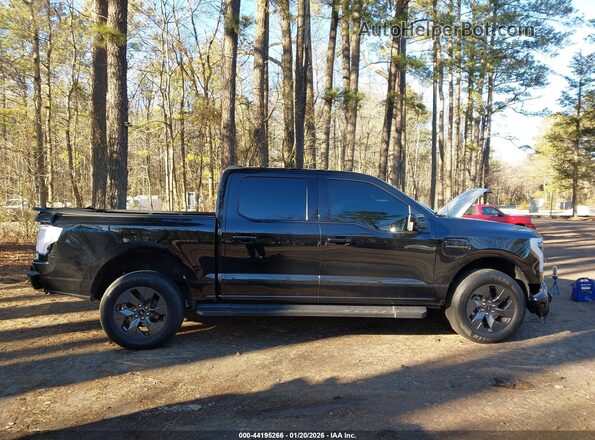 1FT6W1EV8PWG33372 2023 FORD F-150 LIGHTNING Black Rear interior view