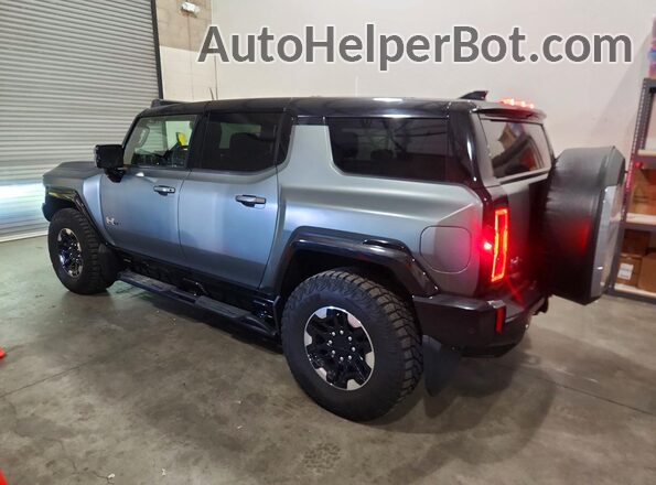 1GKB0RDC0RU103382 2024 GMC HUMMER Серый Задняя левая четверть