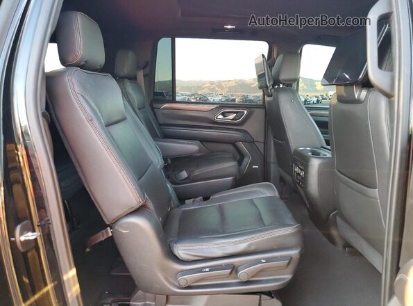 1GNSCGKLXMR432250 2021 CHEVROLET SUBURBAN Black Widok wnętrza z tyłu