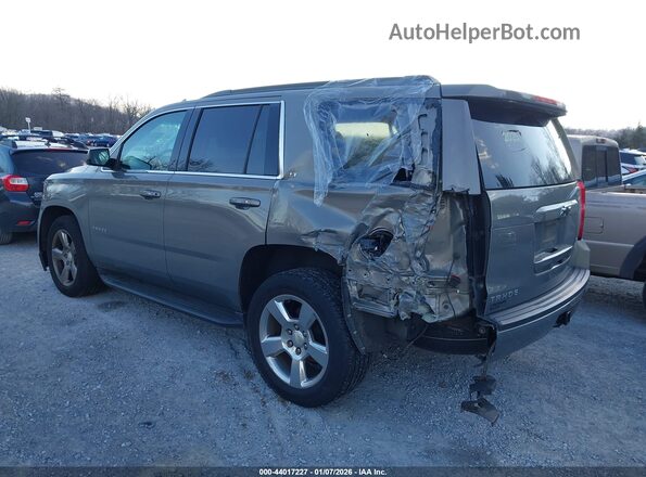 1GNSKBKC9JR100978 2018 CHEVROLET TAHOE Gray Widok z przodu