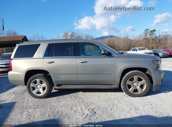 1GNSKBKC9JR100978 2018 CHEVROLET TAHOE Gray Widok wnętrza z tyłu