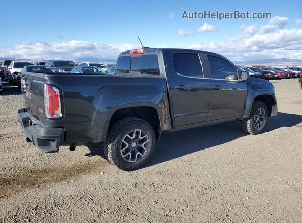 1GTG6CEN4J1201608 2018 GMC CANYON Charcoal Trasero derecho